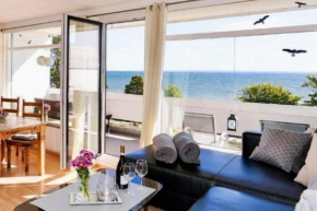 FeWo Traumblick - Strandpanorama in erster Reihe mit TRAUM Meerblick aus dem Bett